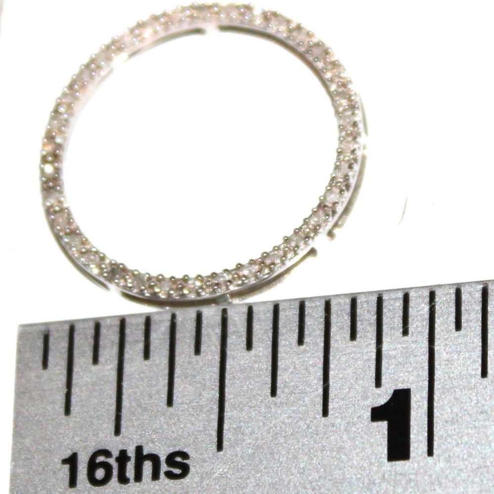 Solid 10K white gold marked 10K clear gemstones circular pendant